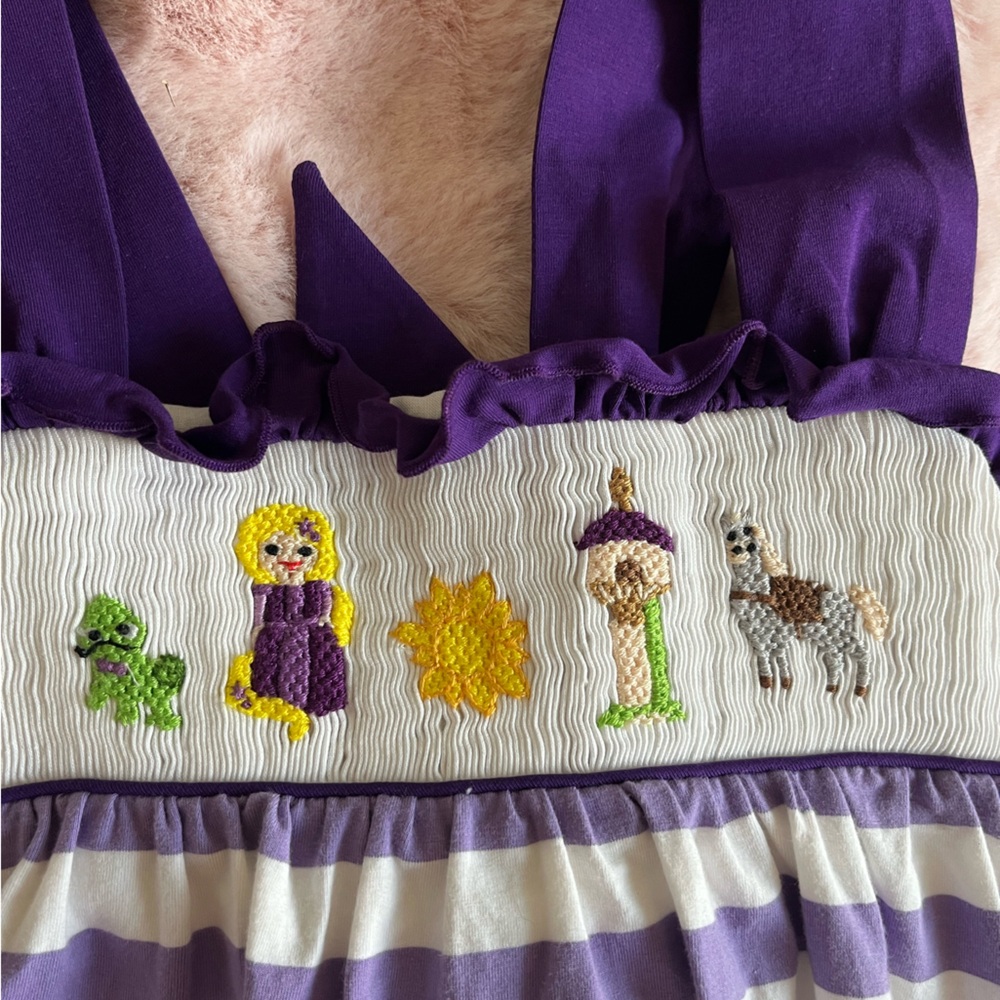 Cutie pie Rapunzel Smocked bubble suit size 4t